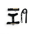 Northern Night black dog harness, collar and leash set with control handle on white background